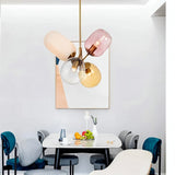 "Modern pendant light with clustered asymmetrical glass shades in a contemporary living room."