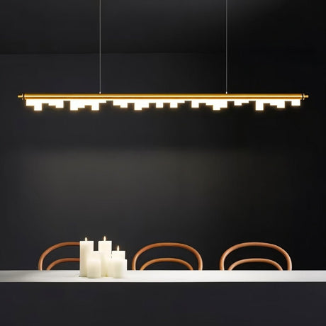 "Gold linear pendant light with geometric acrylic diffusers creating a warm ambiance in a modern dining room."