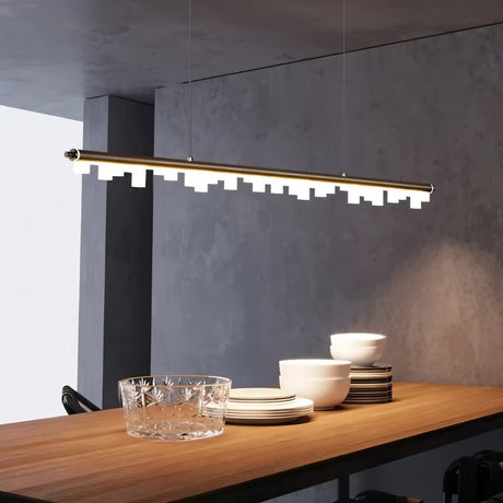 "Modern pendant light with a sleek aluminum frame and geometric acrylic diffusers over a dining table, creating a warm and inviting atmosphere."