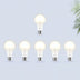 Six warm white LED light bulbs with frosted white shades and silver bases arranged on a light blue background.