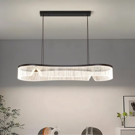 "Minimalist chandelier with a sleek iron frame and undulating acrylic shade, creating a striking focal point in a modern space."