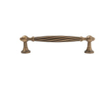 "Brass twisted fluted pull with antique finish"