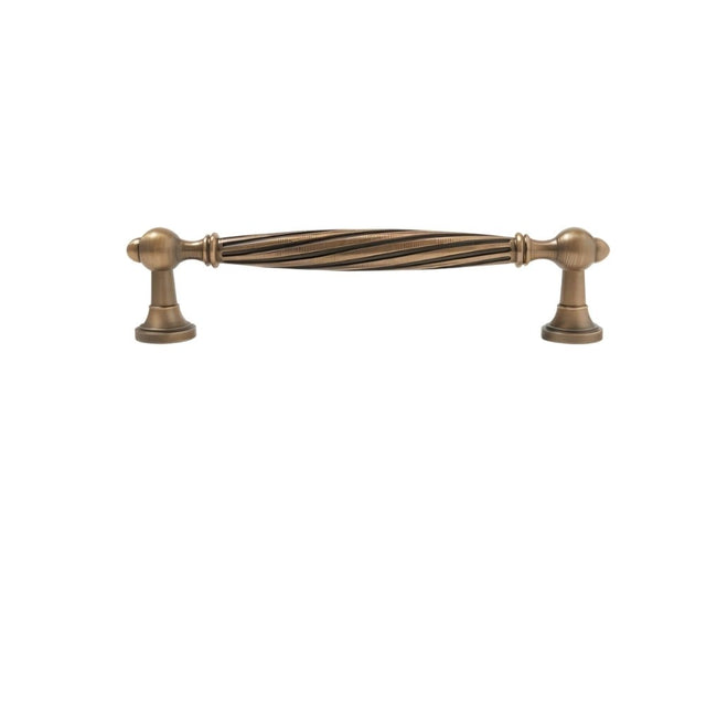 "Brass twisted fluted pull with antique finish"