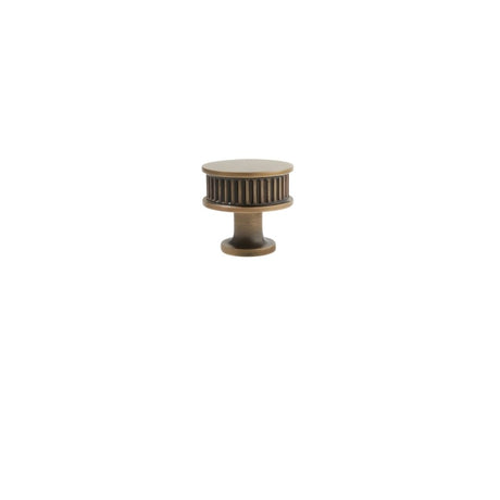 "Brass antique round knob with fluted design"