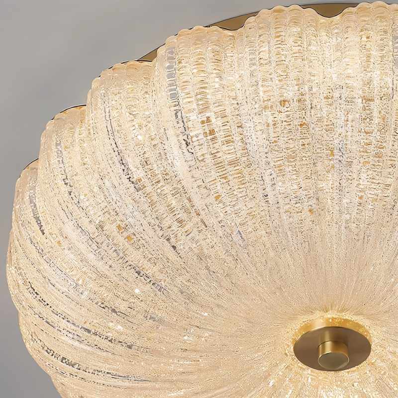 "Close-up of a textured glass shade on a modern ceiling light, showcasing its intricate details and light-diffusing properties."