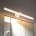 Top-down view of a polished chrome bathroom vanity light fixture with 31-inch bar on white background.