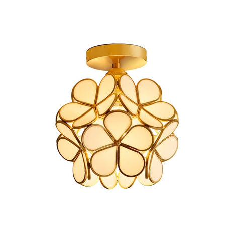 "A modern, floral-inspired ceiling light with a brass frame and luminous, ivory glass petals, providing a soft, elegant glow."