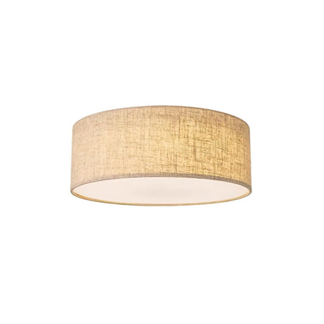 "Close-up of a minimalist fabric drum ceiling light with a soft, textured appearance."