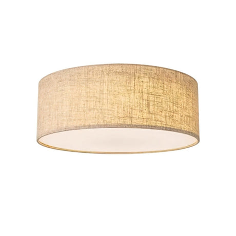 "Minimalist fabric drum ceiling light fixture for ambient lighting in homes."