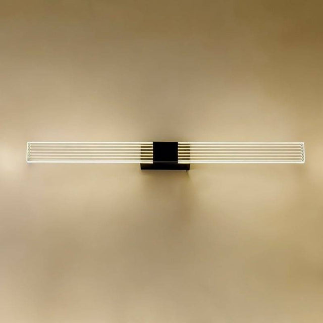 "Modern bathroom vanity light with horizontal slats and a minimalist design on a beige wall."
