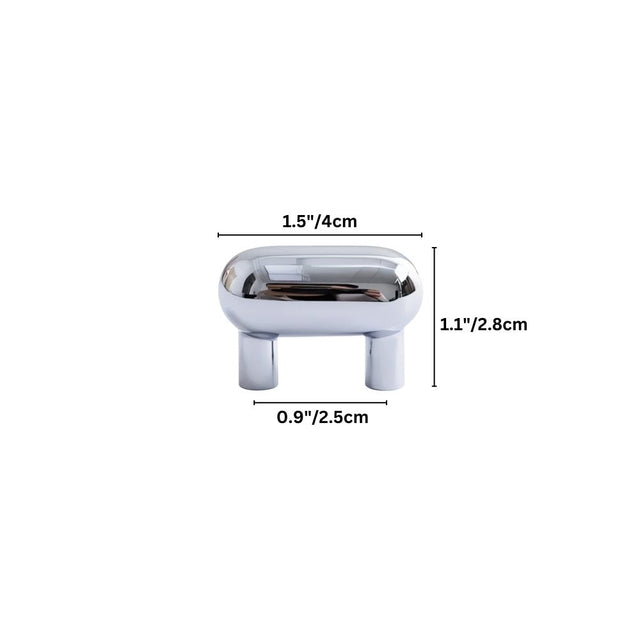 "Dimensions diagram of a capsule-shaped brass knob, showing measurements for width, height, and depth."