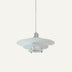 White disc-shaped pendant light with stacked metal shades and chrome hardware, suspended against a neutral background.