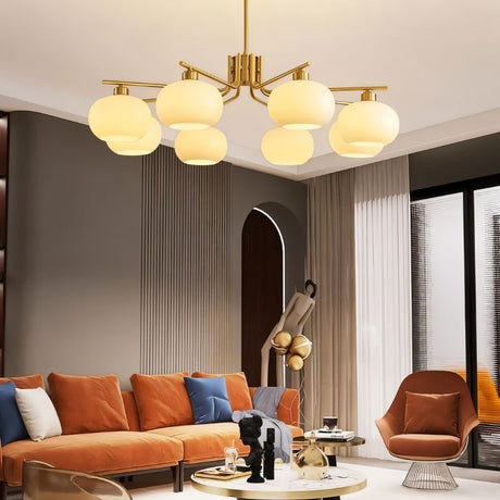 "An 8-light round chandelier with opal glass globes and a gold metal frame, hanging in a modern living room with a colorful couch and decor."