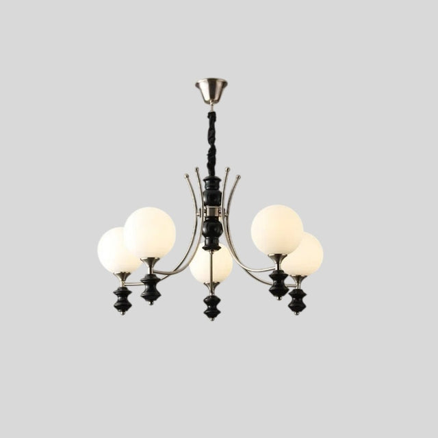 "Modern chandelier with five frosted glass globes, curved arms, and black detailing, isolated on a white background."