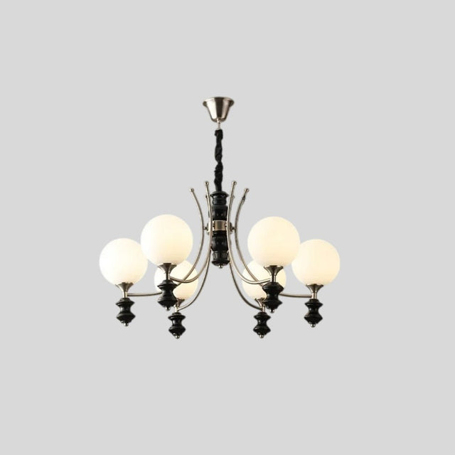 "Modern chandelier with six frosted glass globes, curved arms, and black detailing, isolated on a white background."