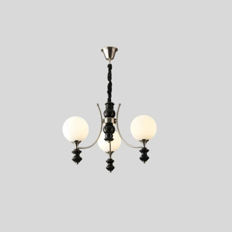 "Modern chandelier with three frosted glass globes, curved arms, and black detailing, isolated on a white background."