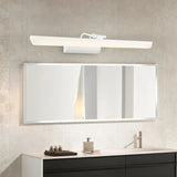 "A white LED vanity light mounted above a rectangular bathroom mirror with a modern sink and countertop."