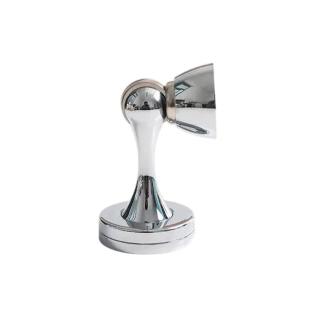 "Sleek, chrome-finished zinc-alloy magnetic door stop with a contoured design, designed to prevent door slams and wall damage in modern interiors."