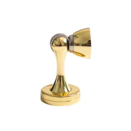 "A sleek, gold-finished zinc-alloy magnetic door stop with a contoured design, designed to prevent door slams and wall damage in modern interiors."