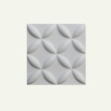 Close-up of a single Bania Wall Panel featuring a white 3D petal pattern, ideal for decorative wall applications.