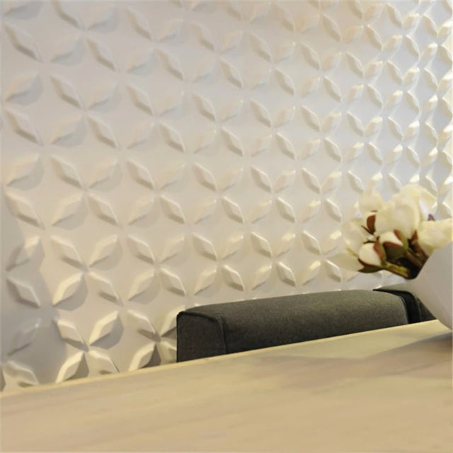 Bania Wall Panel installed on an interior wall, showcasing its 3D geometric PVC design in a modern living space.