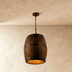 Barrel-shaped pendant light with metal bands, shown suspended from chain against white background, front view.
