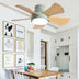 Sage green and natural wood ceiling fan with integrated light mounted in modern kitchen with white cabinetry.