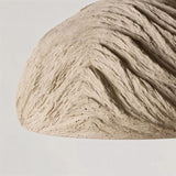 "Close-up detail of a Wabi Sabi cement pendant light, showcasing the raw textures and refined imperfections of the industrial cement finish."