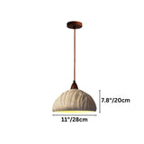 "Dimensions of a Wabi Sabi cement pendant light with a minimalist, rounded shade: 7.8 inches in height and 11 inches in diameter."