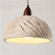 "Wabi Sabi cement pendant light with raw textures and a minimalist, industrial design."
