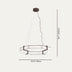 Modern pendant chandelier with white alabaster shade and bronze metal frame suspended by adjustable cord.