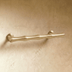 Brushed nickel bamboo-style cabinet pull with mounting hardware shown in front view against white background.