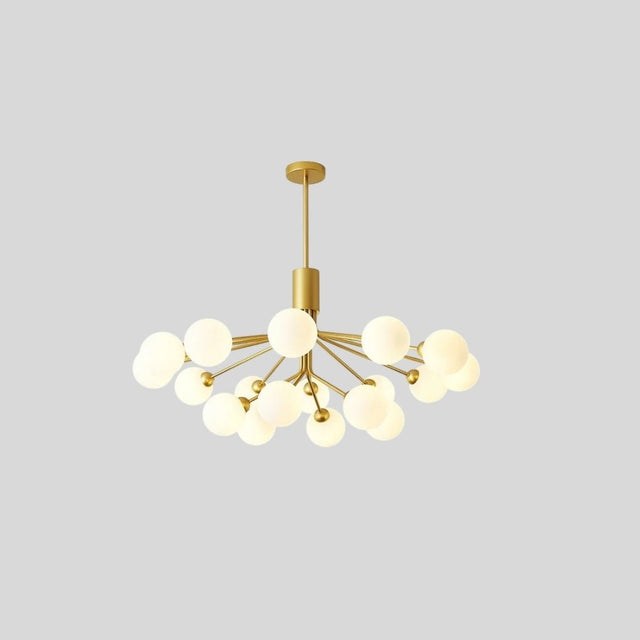 "A gold chandelier with 16 glass balls against a grey background."