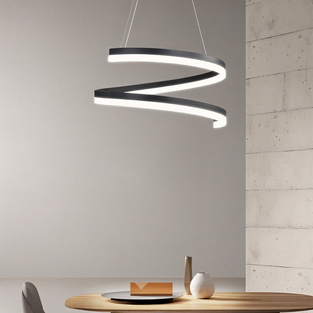 "Modern pendant light with a spiral ribbon design over a dining table in a contemporary dining room."