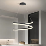 "Modern pendant light with a spiral ribbon design in a contemporary kitchen."