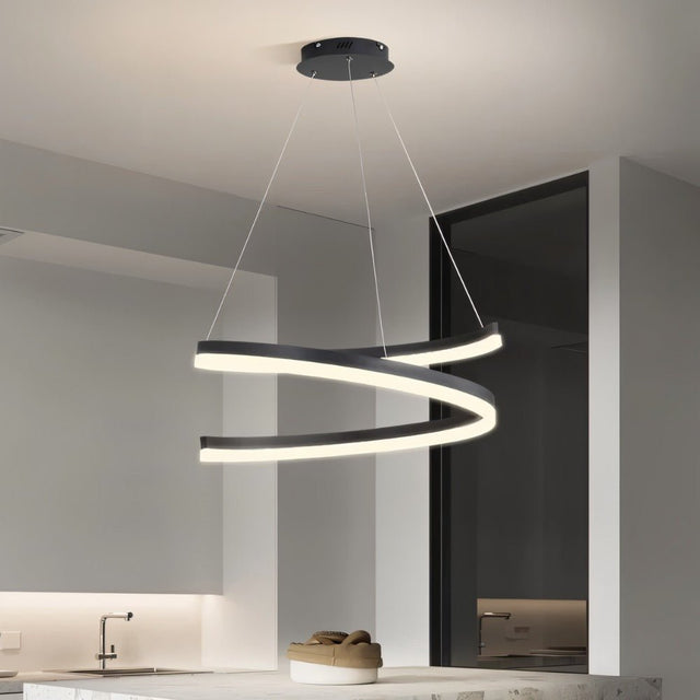 "Modern pendant light with a spiral ribbon design in a contemporary kitchen."