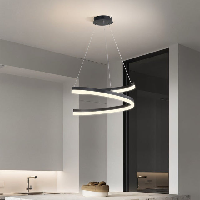 "Modern pendant light with a spiral ribbon design in a contemporary kitchen."