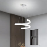 "Modern pendant light with a white spiral ribbon design in a contemporary living room."
