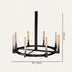 Round chandelier with black metal frame, copper and glass tube candle holders, 48 inches wide.