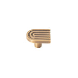 "Brass Art Deco cabinet knob with rounded edges and parallel lines."