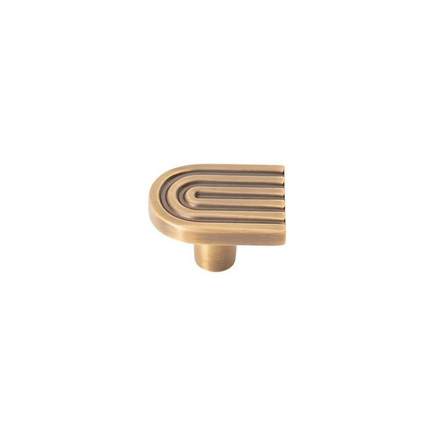 "Brass Art Deco cabinet knob with rounded edges and parallel lines."