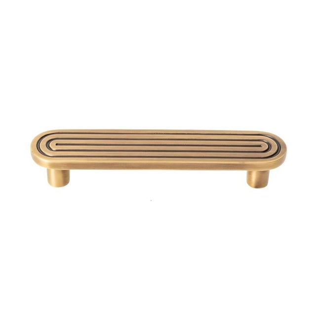 "Brass Art Deco hardware pull with rounded edges and parallel lines."
