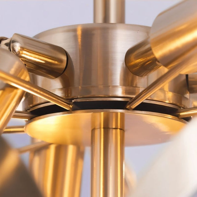 "Close-up of a modern chandelier's brass frame and central rod, showing detailed construction and warm metallic finish."