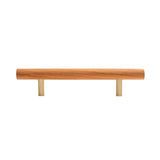 "Modern wooden pull bar handle with brass details on a white background."