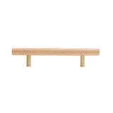 "Light wood pull bar handle with brass details on a white background."