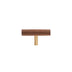 "Modern wooden T-bar knob with brass hardware on a white background."
