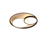 "A modern black ceiling light with interlocking rings, isolated on a white background."
