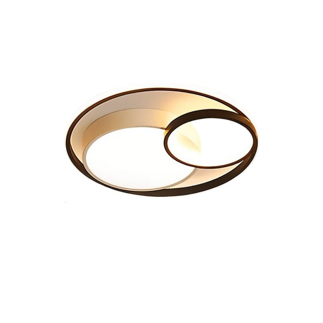 "A modern black ceiling light with interlocking rings, isolated on a white background."