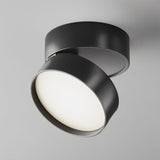 "The Candis Downlight in black, showcasing its sleek aluminum design with an adjustable head for customizable lighting in modern spaces."