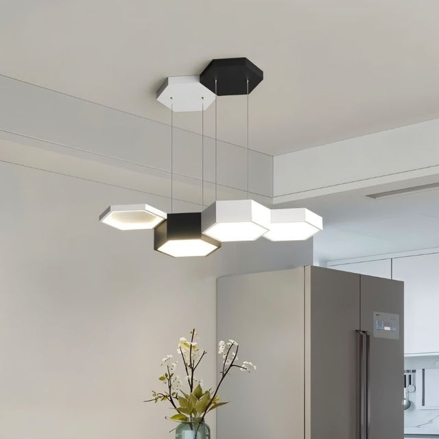 "A modern hexagonal pendant light with multiple heads, providing versatile illumination in a contemporary space."